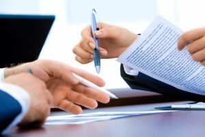 hands sign contract