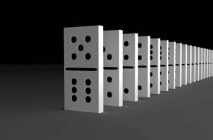 Black and White Dominos - Student Loan Interest Rate